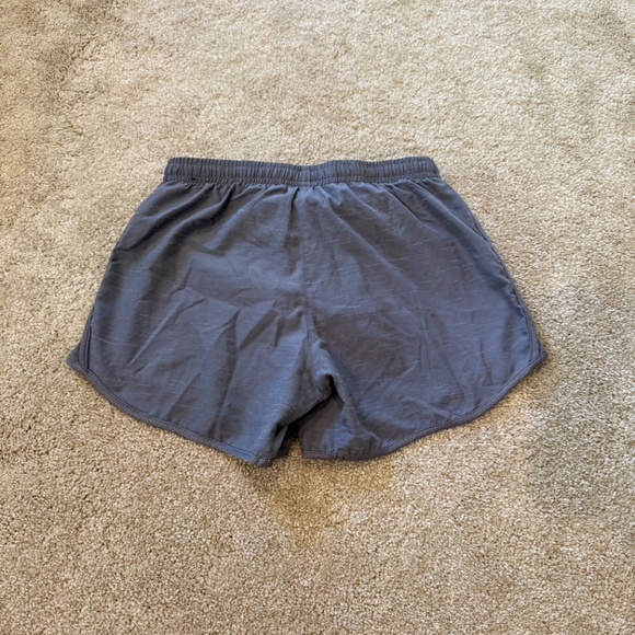 Nike Brand Girls Large Drifit lined running shorts - Picture 2 of 2